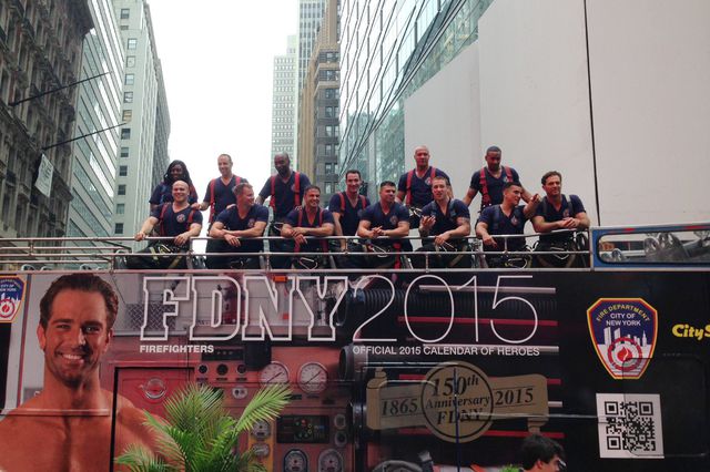 There's a huge tour bus with the calendar<br/>(Photograph by Jen Chung/Gothamist)